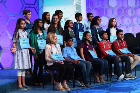 May 31, 2018; National Harbor, MD, USA; Competitors who made it through to the evening round of the finals have they photo taken during the 2018 Scripps National Spelling Bee at the Gaylord National Resort and Convention Center. Mandatory Credit: Jack Gruber-USA TODAY NETWORK