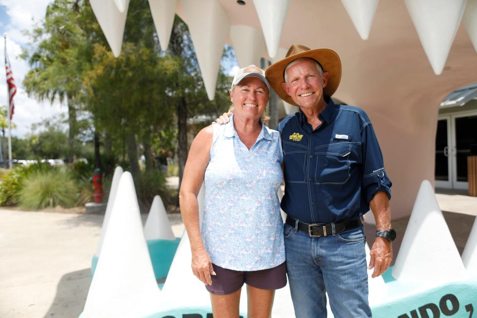 Gatorland theme park owners Diane McHugh, left, and Mark McHugh, President of Gatorland pose for a photo on June 25, 2024, at their family-run amusement park where they are celebrating the park’s 75th anniversary in Orlando, Florida.