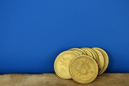 Bitcoin holding above $8,000 after hitting all-time high