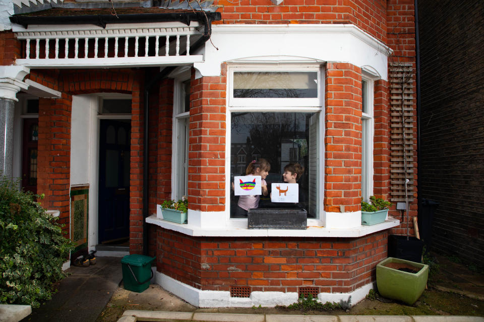 Artwork depicting animals, created by Iggy and Romey, is displayed in a window in Acton, west London, to launch The Great Big Art Exhibition (David Parry/PA)