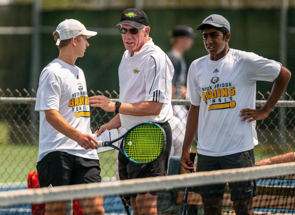 Rock Bridge coach Ben Loeb instructs Max Litton, left, and Akhil Elangoven during the Class 3 boys doubles tennis championship on May 20 at Cooper Tennis Complex in Springfield.