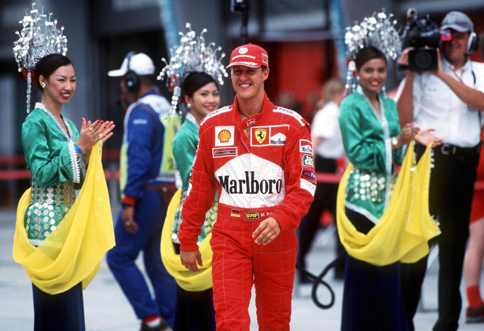 SEPANG, MALAYSIA - OCTOBER 22: GP von MALAYSIA 2000 in Sepang; Michael SCHUMACHER/GER - FERRARI - beim PITWALK (Photo by Andreas Rentz/Bongarts/Getty Images)