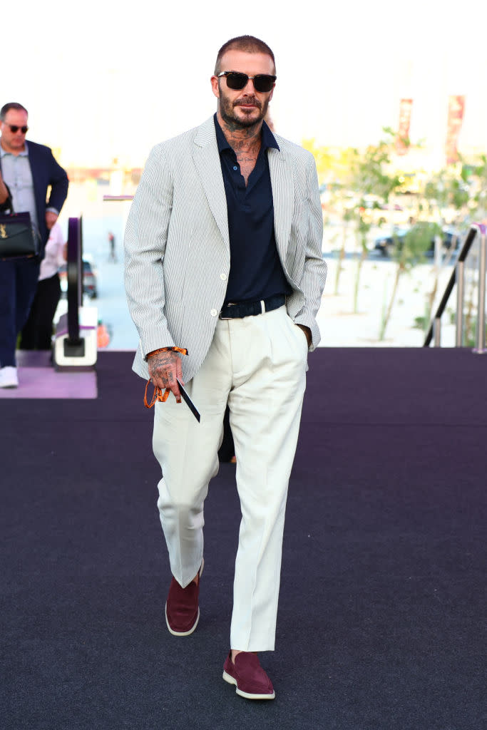 LUSAIL CITY, QATAR - OCTOBER 07: David Beckham walks in the Paddock during the Sprint Shootout ahead of the F1 Grand Prix of Qatar at Lusail International Circuit on October 07, 2023 in Lusail City, Qatar. (Photo by Dan Istitene - Formula 1/Formula 1 via Getty Images)