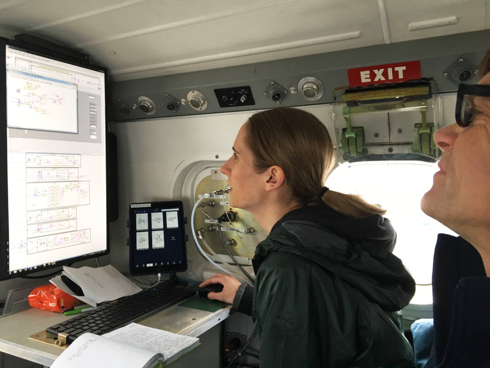 In this 2018 photo, Genevieve Plant, left, of the University of Michigan and NOAA's Colm Sweeney, review measurements of methane and other gases during an airborne research project during a flight near Manassas Regional Airport in Manassas, Va. In older Eastern US cities, nine times as much natural gas is leaking out of pipelines, homes than federal government had thought. NOAA's airplane sees much more methane coming out of New York City, Washington, Boston, Philadelphia, Baltimore and Providence than EPA had figured. Scientists said Monday, July 22, 2019, it isn’t a safety problem, but it is a climate change issue. Fixing those leaks can help in the fight against global warming. (Eric Kort/University of Michigan via AP)