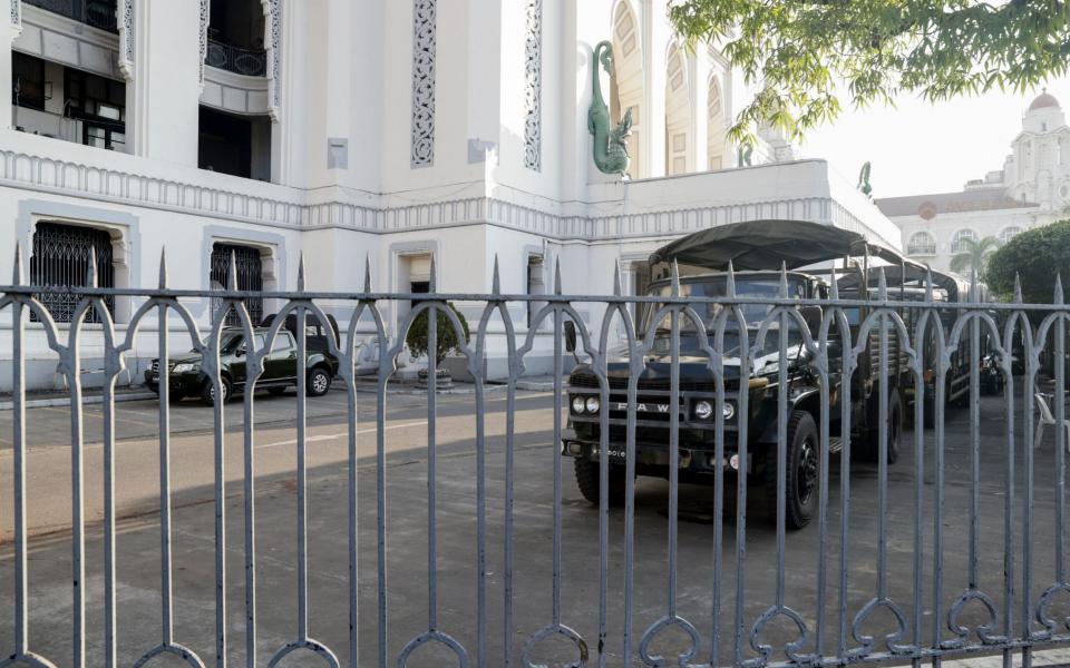 Military trucks are seen inside Yangon City Hall, which is now under the control of the Myanmar military - EPA