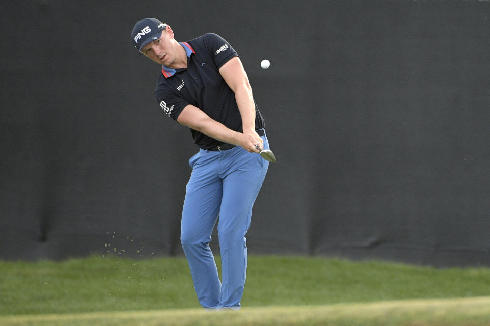 Matt Wallace, of England, chips onto the 17th green during the third round of the Arnold Palmer Invitational golf tournament Saturday, March 9, 2019, in Orlando, Fla. (AP Photo/Phelan M. Ebenhack)