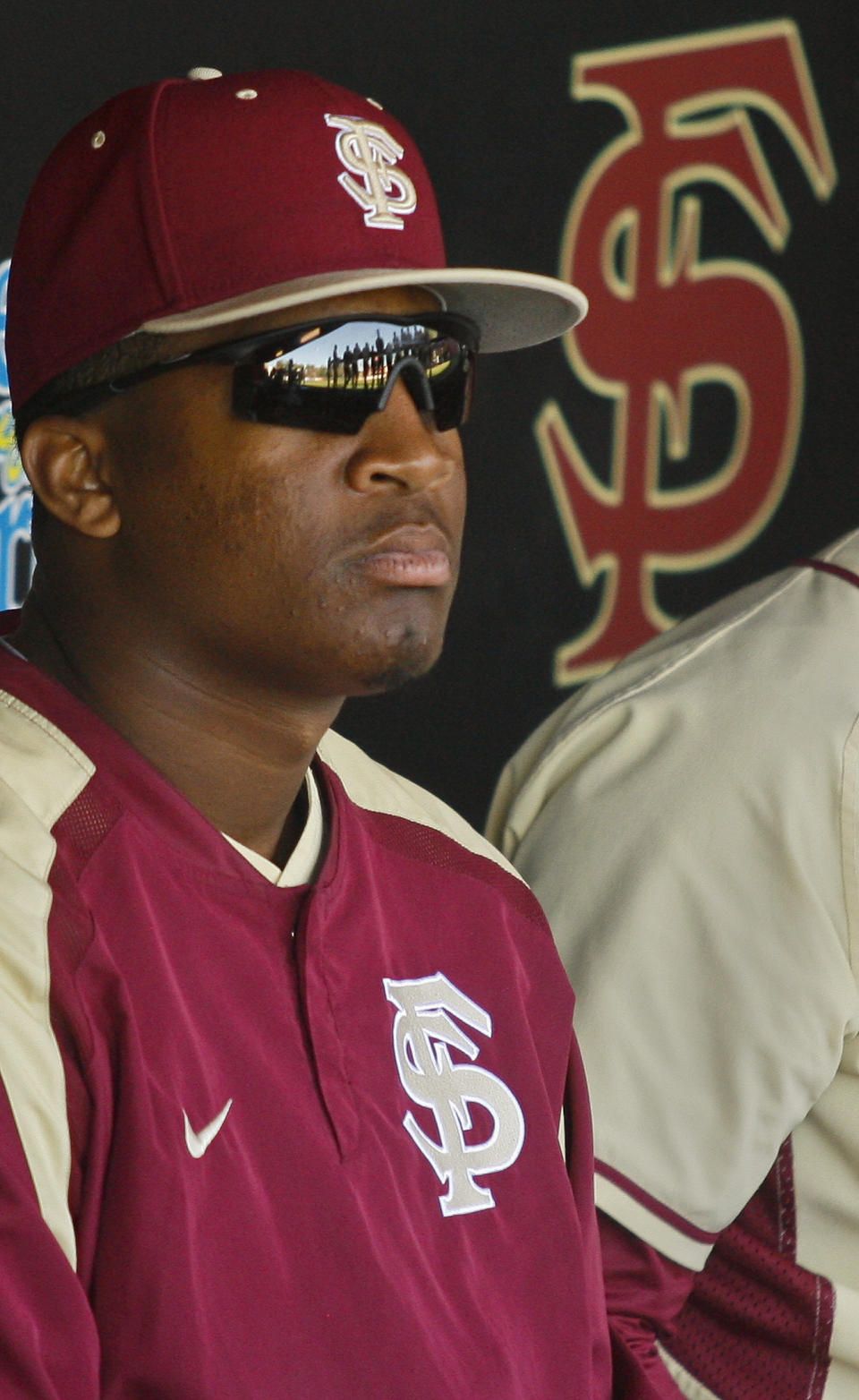 FILE - In this March 2, 2014, file photo, Florida State relief pitcher Jameis Winston sits in the dugout in the sixth inning of an NCAA college baseball game against Miami in Tallahassee, Fla. The Florida State baseball team has indefinitely suspended Heisman Trophy winner Jameis Winston, who is a relief pitcher for the Seminoles. Baseball coach Mike Martin said in a statement Wednesday, April 30, 2014, that Winston was issued a citation the night before, but he did not give specifics. The Leon County Sheriff's Office has declined comment. (AP Photo/Phil Sears, File)