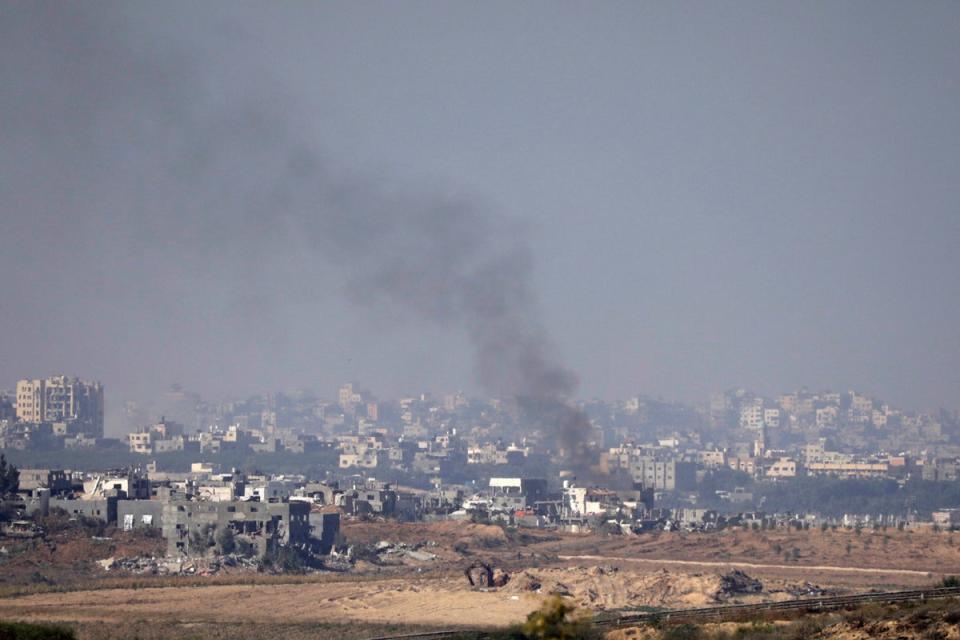 Smoke rises from inside the Gaza Strip on Saturday (Getty Images)