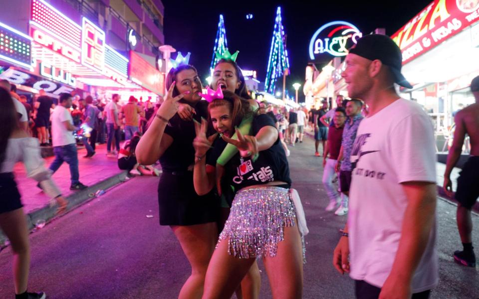 Tourists visit the popular Punta Ballena strip on June 30, 2019 in Magaluf, Spain. Magaluf, where most of the nightclubs and bars are located, is one of the main destinations for British tourists during the summer season - Getty Images