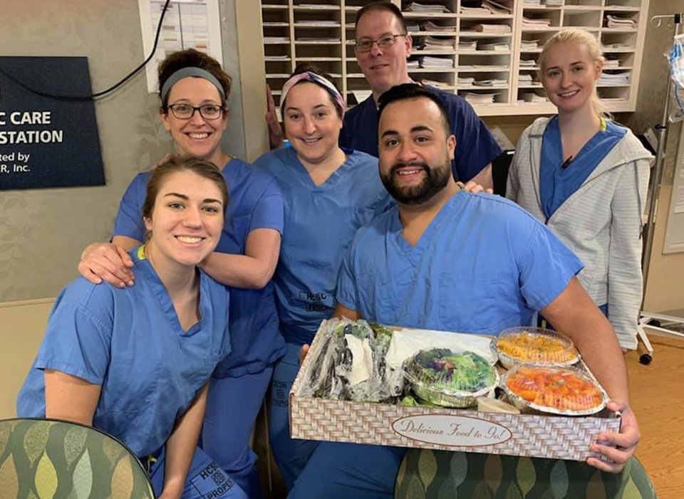 Staff at the Morristown Medical Center enjoy a meal delivered by their local FLAG group. (Liz Bernich)