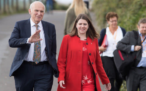 Liberal Democrat deputy leader Jo Swinson and party leader, Vince Cable arrive for his leader's speech - Credit: Matt Cardy/Getty 