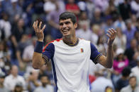 Carlos Alcaraz, of Spain, reacts after defeating Stefanos Tsitsipas, of Greece, during the third round of the US Open tennis championships, Friday, Sept. 3, 2021, in New York. (AP Photo/Seth Wenig)