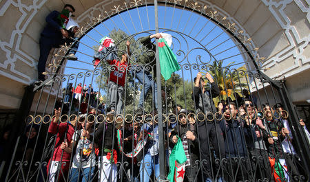 FILE PHOTO: Students protest against Abdelaziz Bouteflika's plan to extend his 20-year rule by seeking a fifth term in April elections, at a university in Algiers, Algeria, March 3, 2019. REUTERS/Ramzi Boudina