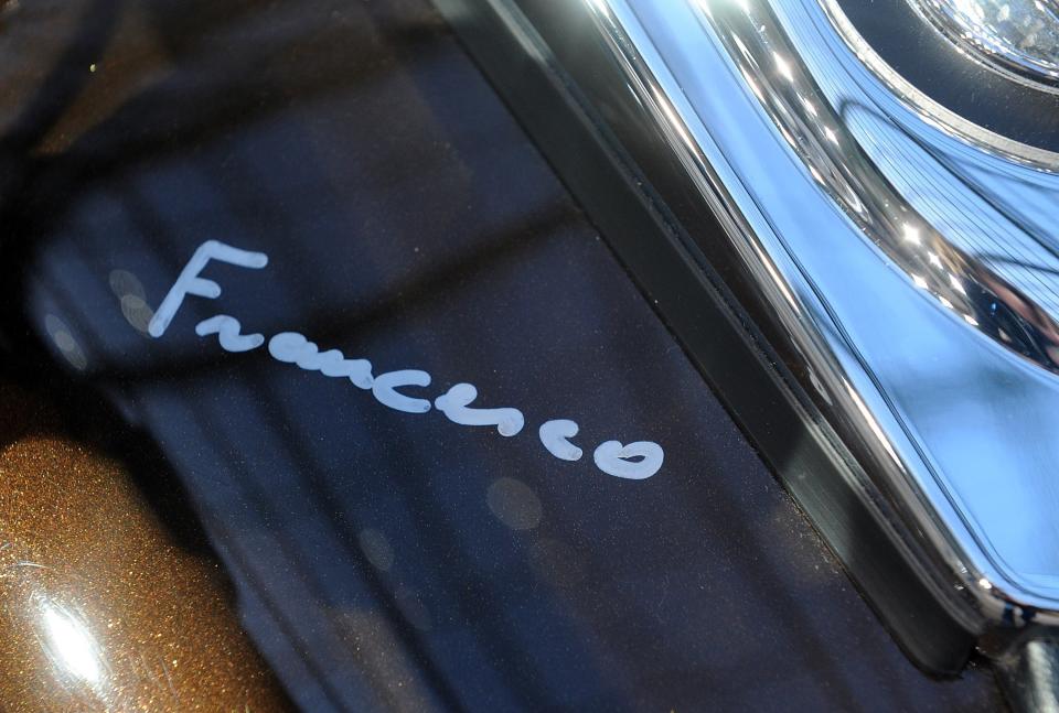 Pope Francis signed the tank of&nbsp;the motorcycle.&nbsp; (Photo: Antoine Antoniol via Getty Images)