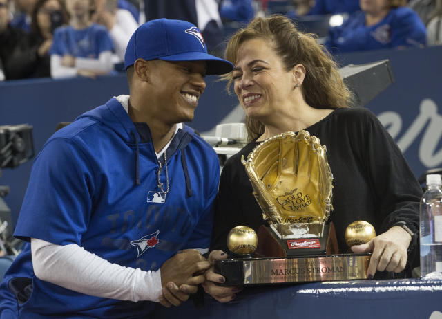 Toronto Blue Jays starting pitcher Marcus Stroman kisses his glove before  his first pitch against the Kansas City Royals in the ALCS game 3 at the  Rogers Centre in Toronto, Canada on