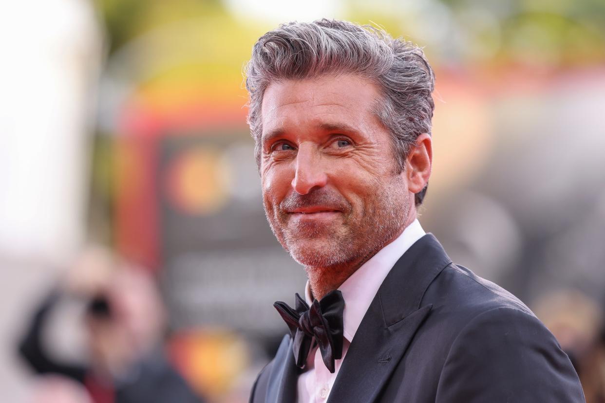 Patrick Dempsey poses for photographers upon arrival for the premiere of the film "Ferrari" during the 80th edition of the Venice Film Festival, Aug. 31, 2023, in Venice, Italy. On Tuesday, Nov, 7, People magazine named Dempsey as its Sexiest Man Alive.