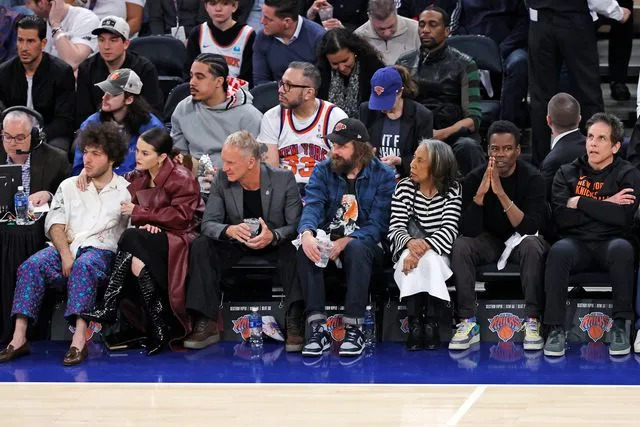 <p>Sarah Stier/Getty </p> Benny Blanco (left), Selena Gomez, Sting, Chris Rock, and Ben Stiller in New York City on April 22, 2024