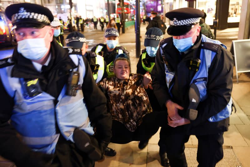 Protestors from the Million Mask March and anti lockdown protesters demonstrate in London