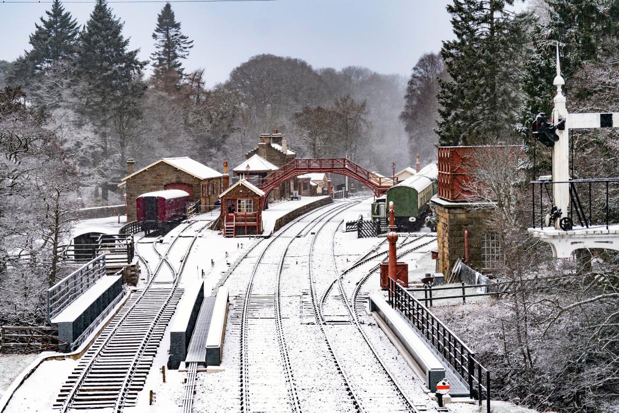 Goathland train station in North Yorkshire blanketed in snow (PA)