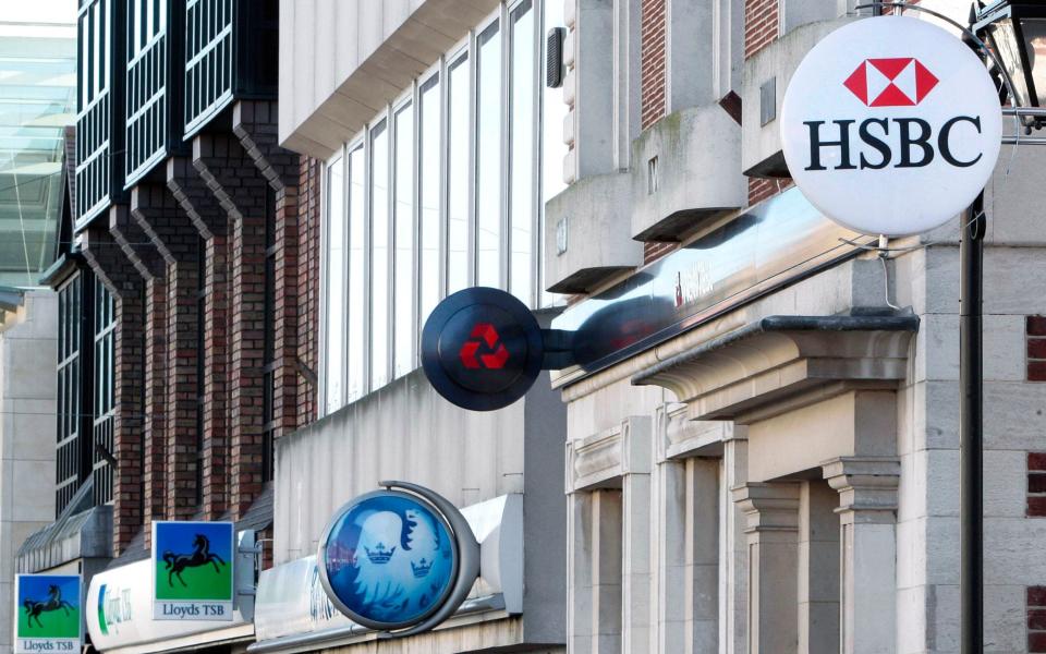 Branches of U.K. high street banks display their logos on signs