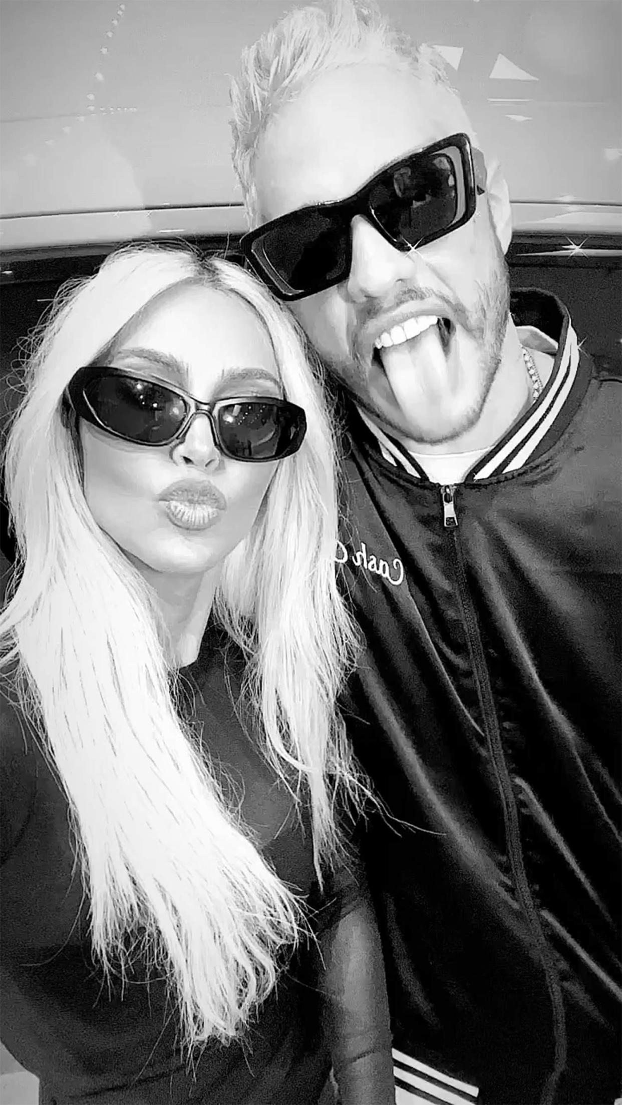 Kim Kardashian and Pete Davidson stick out their tongues while wearing sunglasses on Instagram. (kimkardashian / Instagram)