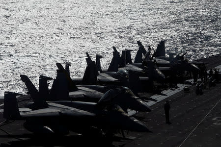 Fighter jets are seen on the deck of the USS Ronald Reagan in the South China Sea September 30, 2017. REUTERS/Bobby Yip