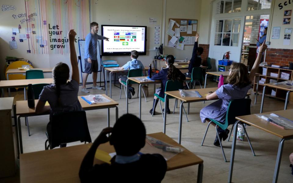 A year six classroom at St John's Primary School as some children returned to the school following the easing of lockdown -  Kevin Coombs/Reuters