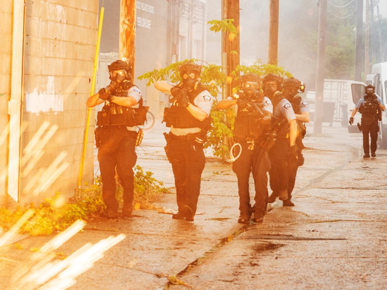 Police fire projectiles near the Minneapolis 3rd Police Precinct. People gathered at Chicago Ave. and East 38th Street during a rally in Minneapolis on Tuesday, May 26, 2020.Richard Tsong Taatarii:Star Tribune via Getty Images)