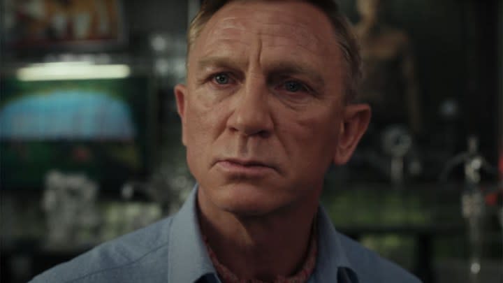 Daniel Craig as Benoit Blanc looking puzzled in Glass Onion: A Knives Out Mystery.