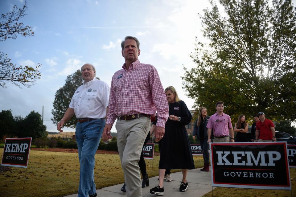 Georgia Governor Brian Kemp arrives at a campaign stop in Evans Towne Center Park on Saturday, Nov. 5, 2022. Kemp met with voters and encouraged people to turn out to the polls next week. 