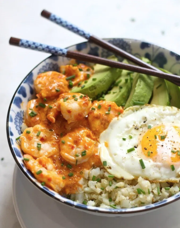 <p>The Organic Kitchen</p><p>A quick, easy, healthy meal made in about 15-20 minutes!</p><p><strong>Get the recipe: <a href="https://www.theorganickitchen.org/spicy-shrimp-and-cauliflower-rice-bowl-paleo-whole-30/" rel="nofollow noopener" target="_blank" data-ylk="slk:Spicy Shrimp and Cauliflower Rice Bowls;elm:context_link;itc:0;sec:content-canvas" class="link rapid-noclick-resp">Spicy Shrimp and Cauliflower Rice Bowls</a></strong></p>