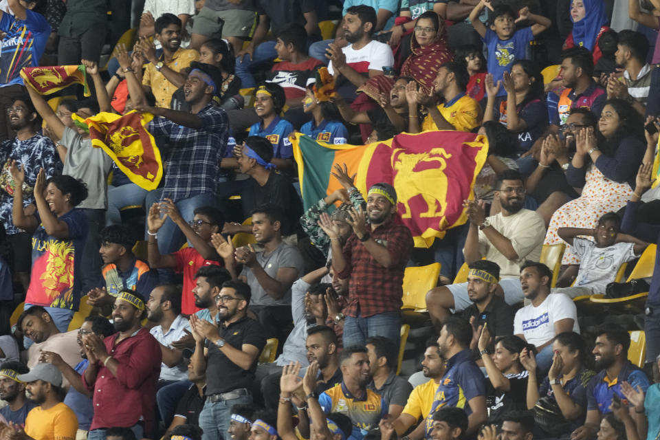 Sri Lankans cheer during the Asia Cup cricket match between Pakistan and Sri Lanka in Colombo, Sri Lanka on Thursday, Sept.14, 2023. (AP Photo/Eranga Jayawardena)