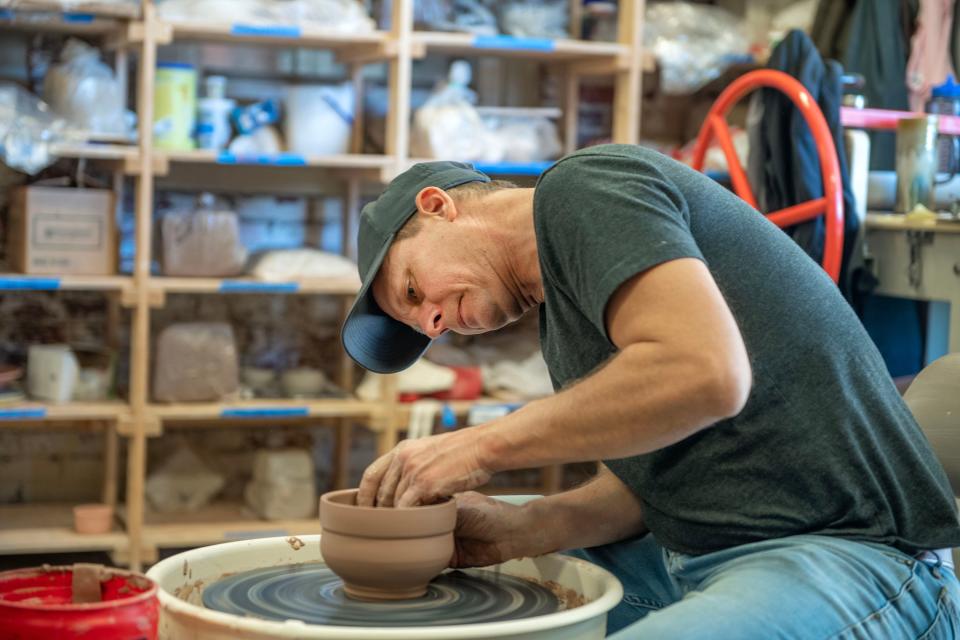 Potter Ben Twingley puts the finishing touches on a bowl at First City Art Center Sunday, January 15, 2023. in preparation for Manna Food Pantries' 2023 Clover Pick A Bowl Fill A Bowl.