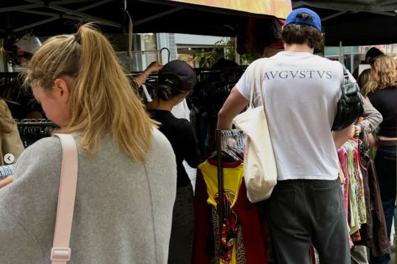 Singer Olivia Rodrigo and actor Louis Partridge were spotted browsing the aisles at Lockup Vintage in Ancoats