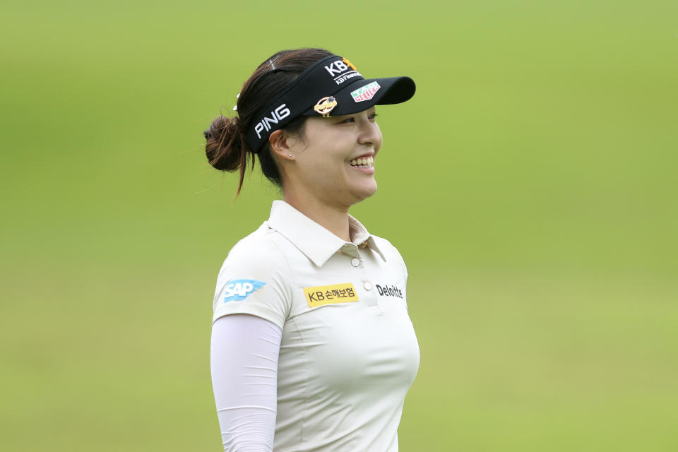 In Gee Chun of South Korea walks along the fairway on the first hole during her final round at the Women's World Championship golf tournament at Sentosa Golf Club in Singapore, Sunday, March 6, 2022. (AP Photo/Paul Miller)