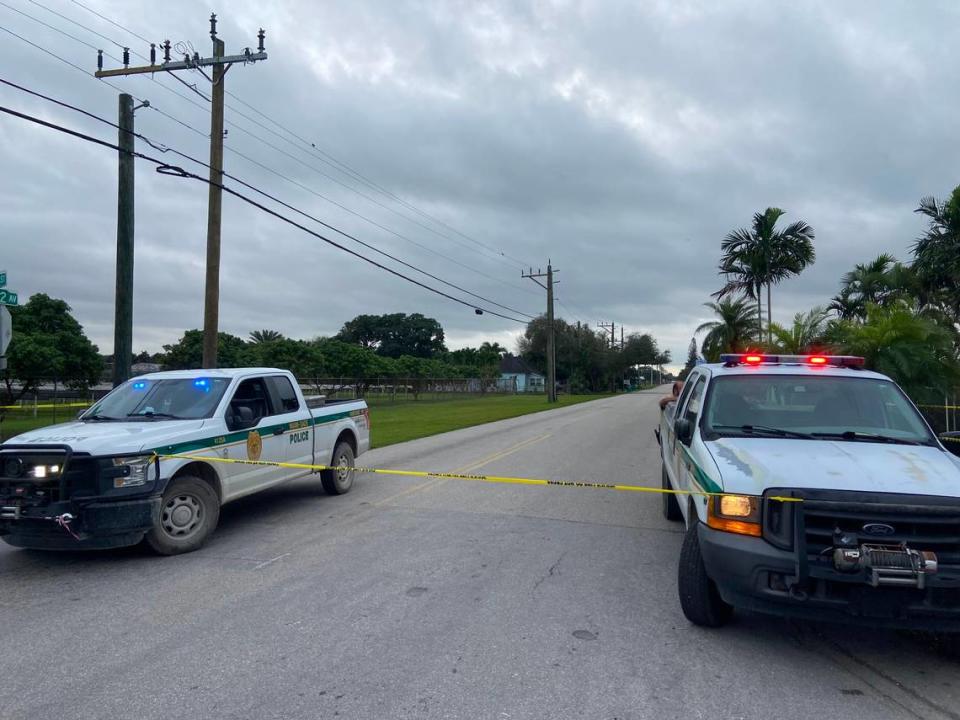 Miami-Dade police blocked Southwest 216th Street and 162nd Avenue early Thursday morning, Jan. 18, 2024, after two Miami-Dade police officers were shot while responding to a call in the area late Wednesday evening.