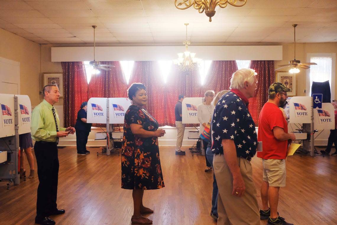 Voting at a little after 7:30 a.m. at the Howard Community Center in suburban Macon. For the latest election results, visit www.macon.com.