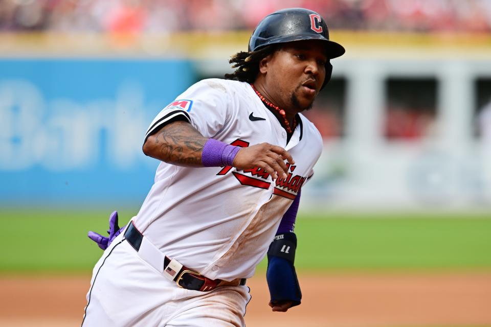 Cleveland Guardians' Jose Ramirez (11) rounds third base en route to scoring on a wild pitch during the third inning against the Washington Nationals on Saturday in Cleveland.