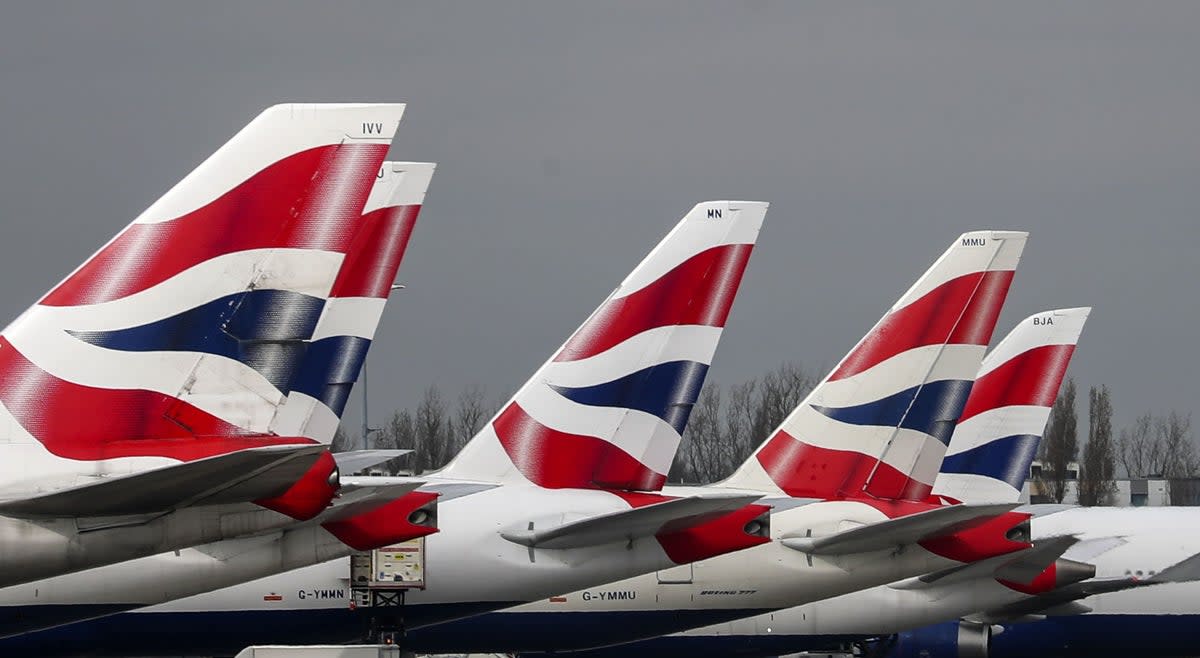 British Airways planes at London Heathrow, where passenger service agents have voted to strike  (PA Wire)