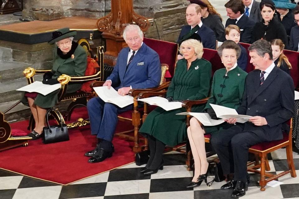 Queen Elizabeth II at the service of thanksgiving for her late husband, Prince Philip Duke of Edinburgh, in Westminster Abbey, on March 29, 2022. She is flanked by Prince Charles, Duchess Camilla of Cornwall, Princess Anne and her husband Vice Admiral Timothy Laurence. Behind them are Prince William and his children, Prince George and Princess Charlotte.