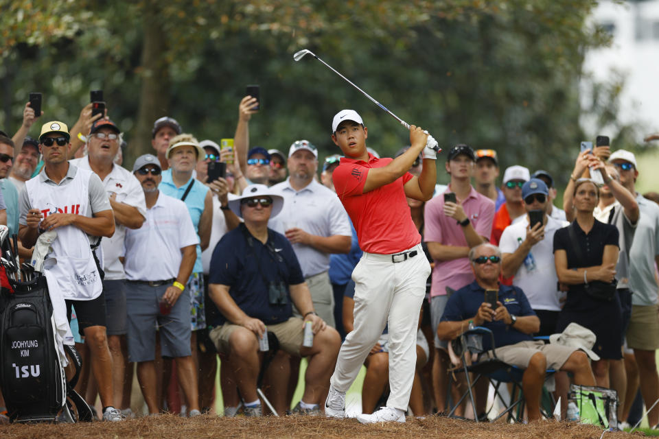 Players, like Tom Kim, and fans alike will need to take precautions this weekend at the Tour Championship. (Mike Ehrmann/Getty Images)