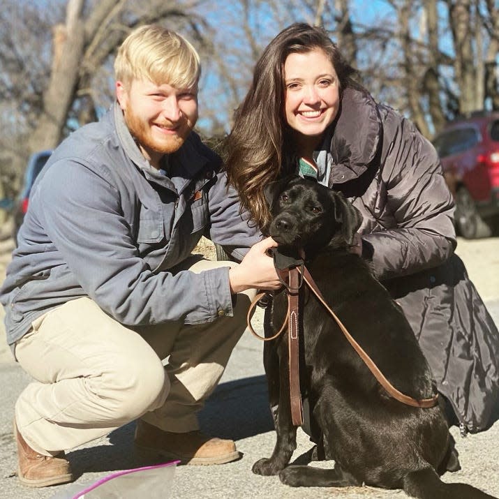 Quincy reporter Mary Whitfil with her fiancé, Kyle, and dog, Ranger.