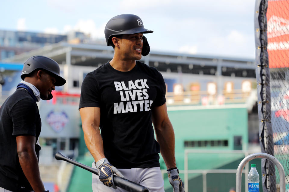 WASHINGTON, DC - JULY 23:  Giancarlo Stanton #27 of the New York Yankees looks on during batting practice while wearing a Black Lives Matter t-shirt prior to the game between the New York Yankees and the Washington Nationals at Nationals Park on Thursday, July 23, 2020 in Washington, District of Columbia. (Photo by Alex Trautwig/MLB Photos via Getty Images)