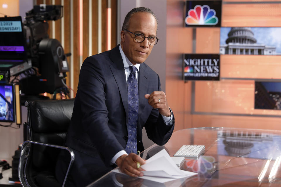 This July 31, 2019 photo shows Lester Holt, anchor of "NBC Nightly News," and host of "Dateline NBC" on the set of his weekday evening news set in New York. Holt spent a couple of nights locked up in Louisiana's notorious Angola prison earlier this year for a "Dateline NBC" episode about criminal justice reform. The episode airs Friday night on NBC. (AP Photo/Richard Drew)