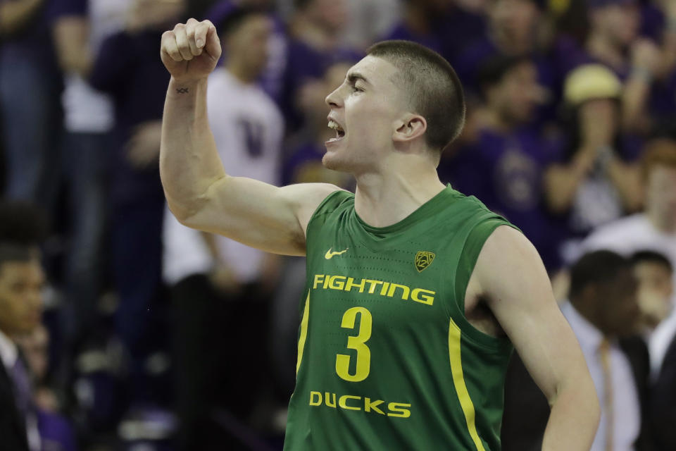 Oregon guard Payton Pritchard (3), reacts after he made the game-winning 3-point basket in overtime of an NCAA college basketball game against Washington, Saturday, Jan. 18, 2020, in Seattle. Oregon won 64-61 in overtime. (AP Photo/Ted S. Warren)