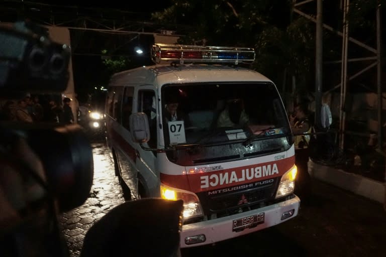 An ambulance carrying the coffin of executed Indonesian drug convict Freddy Budiman leaves Wijayapura pier in Cilacap, Central Java province on July 29, 2016