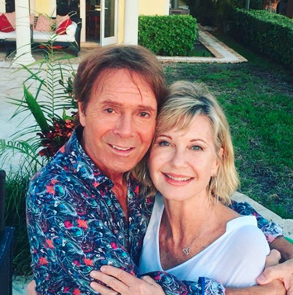 Olivia Newton-John and long-term friend Ciff Richard caught up for a cheeky reunion on Thursday.