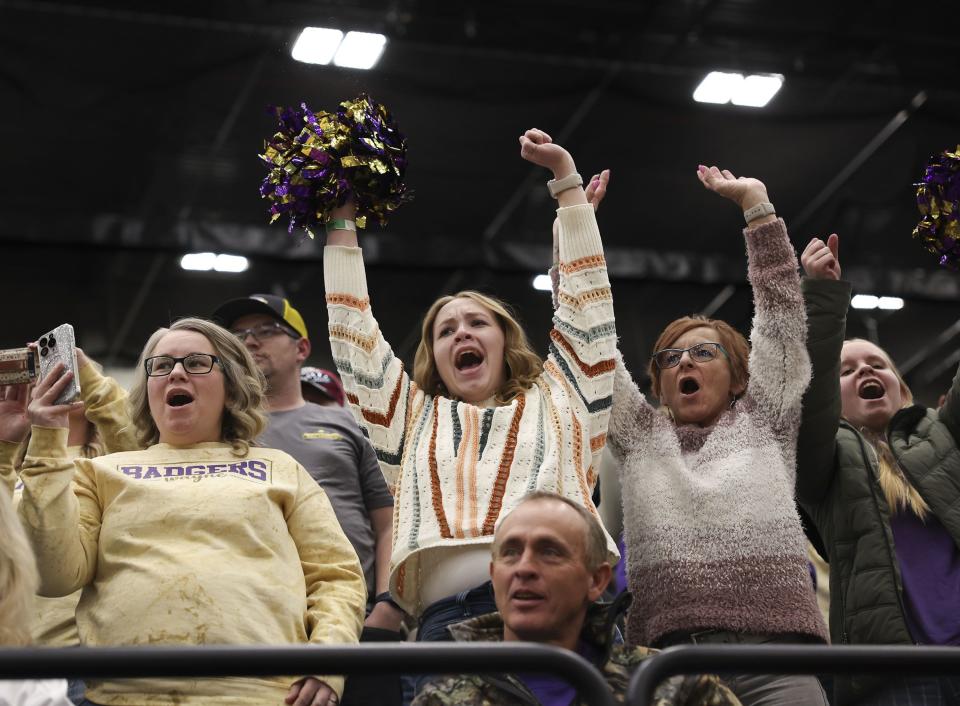 Wayne High School fans cheer on the school’s cheerleading team at the Competitive Cheer Tournament at the UCCU Center at Utah Valley University in Orem on Thursday, Jan. 25, 2023. | Laura Seitz, Deseret News