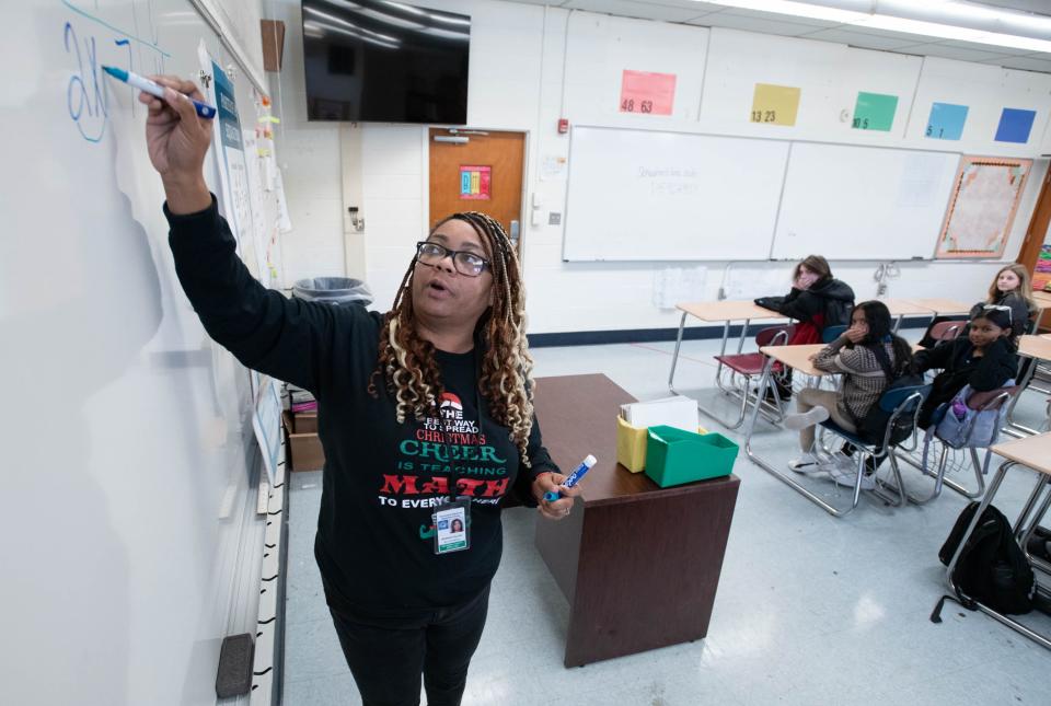 Monique Collick teaches a math class at Bellview Middle School in Pensacola on Monday, Dec. 18, 2023. The school will become the third school in Escambia County to adopt the Community Partnership Schools model.