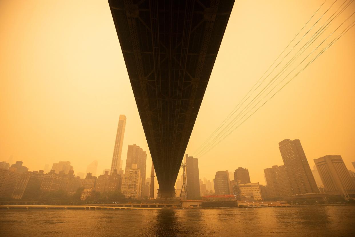 View of the Ed Koch Queensboro Bridge as smoke from Canadian wildfires casts a haze over the area on June 7, 2023 in New York City. Air pollution alerts were issued across the United States due to smoke from wildfires that have been burning in Canada for weeks.